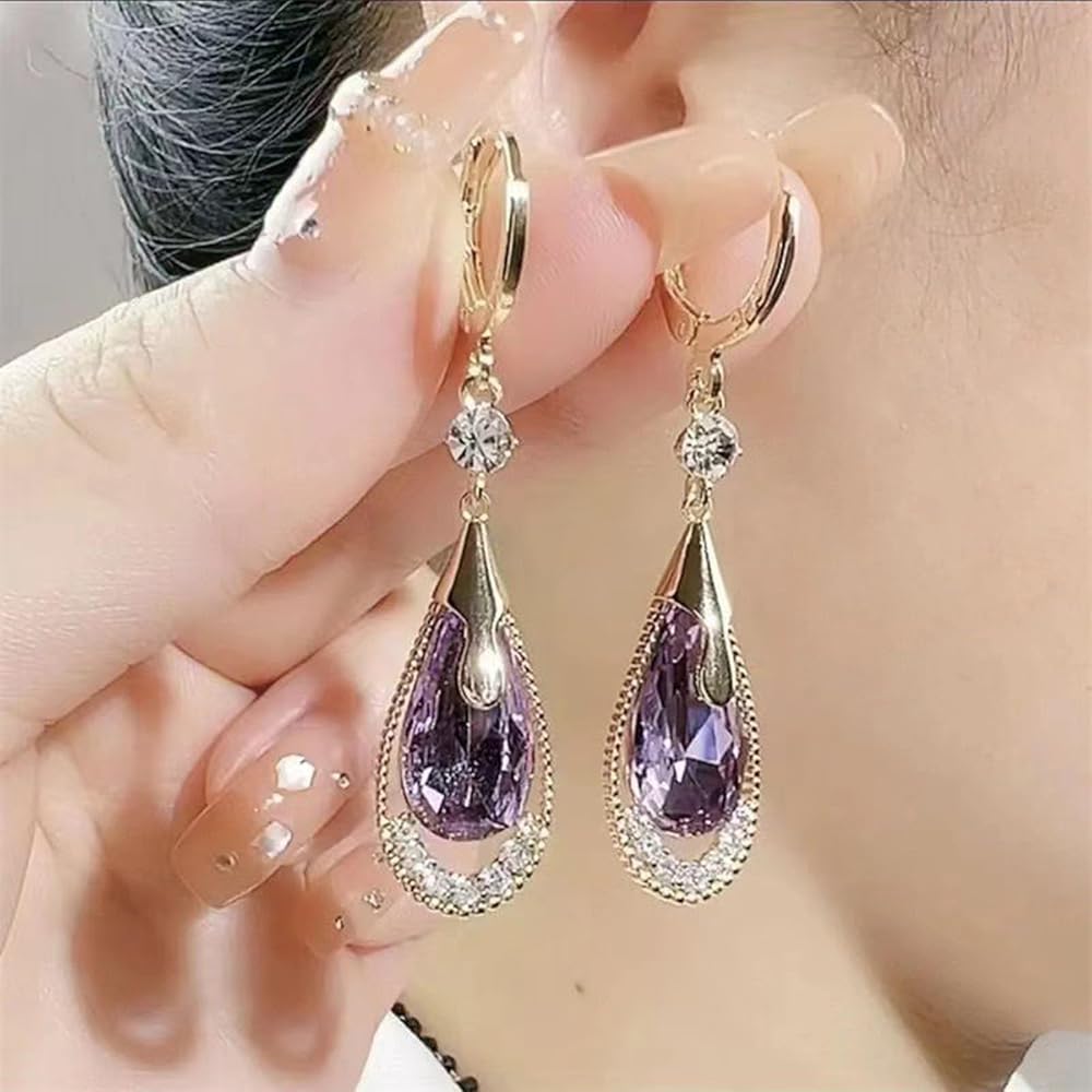 Boucles d'Oreilles
Cristal Émeraude
Goutte de lumière dorée ✨