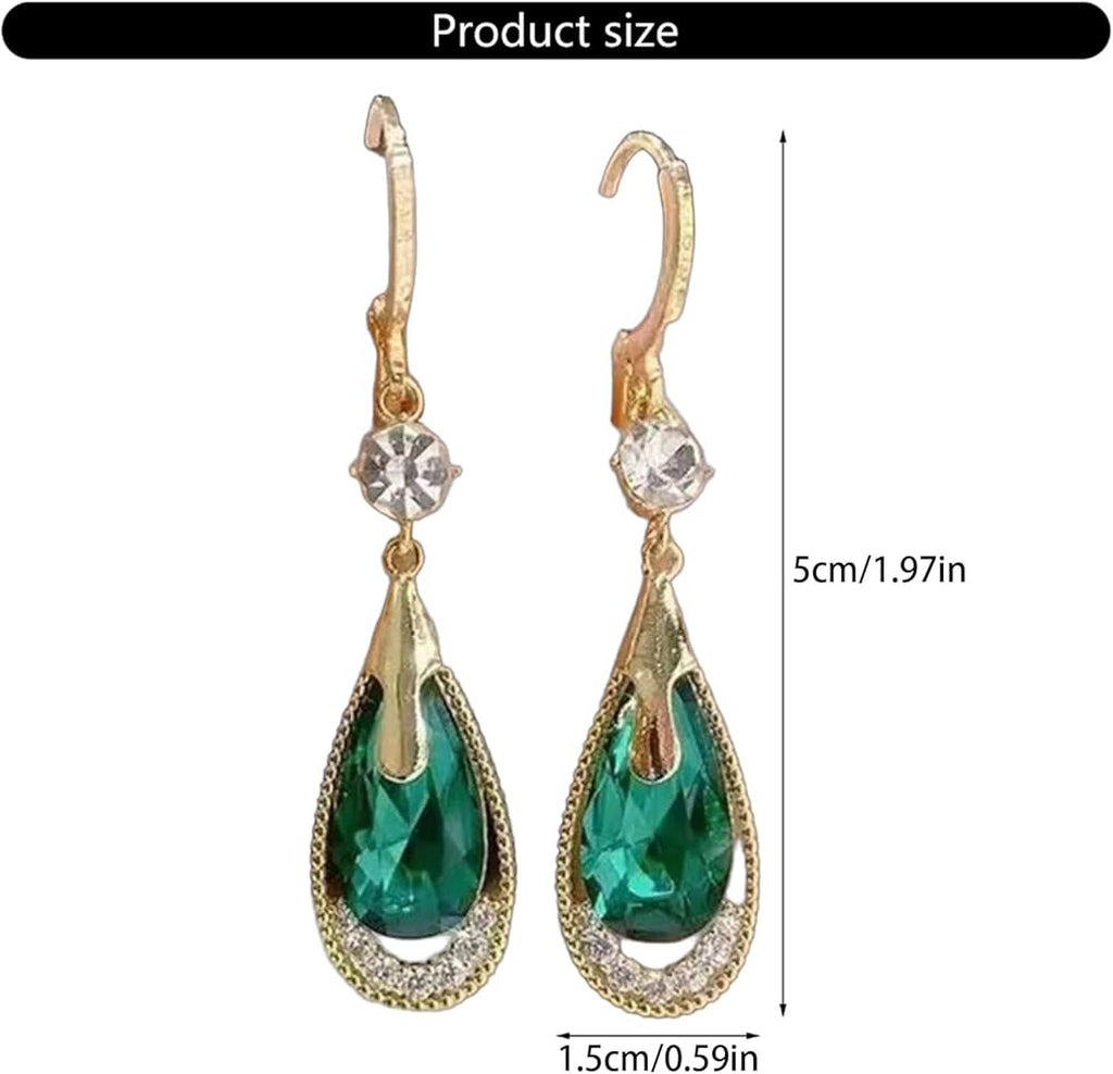 Boucles d'Oreilles
Cristal Émeraude
Goutte de lumière dorée ✨